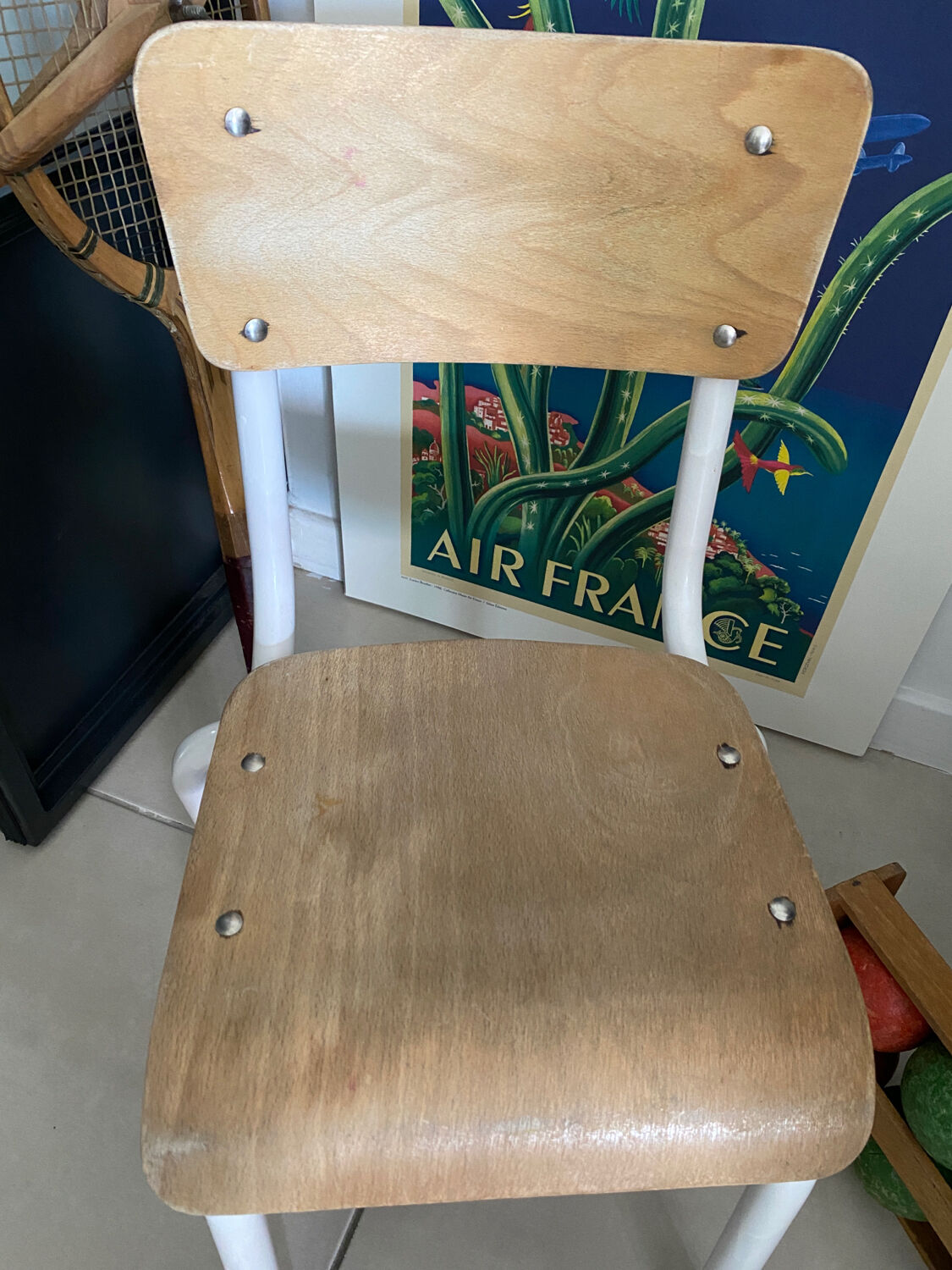 Old wooden and metal children's school chair