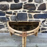 Console / coffee table in rattan and tempered glass.