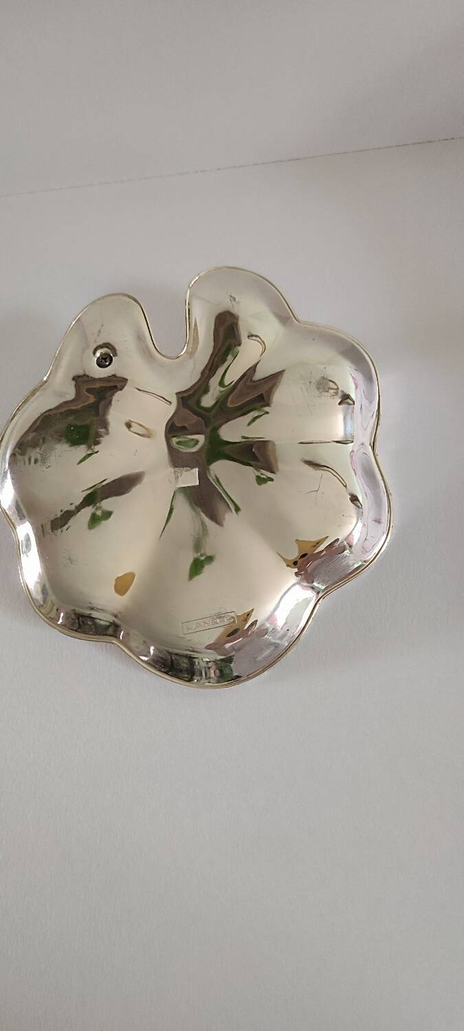 A Lancel pocket tray in silver metal.