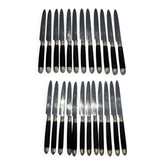 Ménagère de couteaux de style Empire en ébène, viroles et culots en argent
