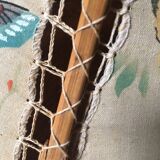 Suspension flower fabric and wood.