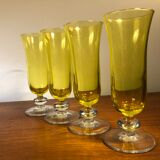 Large transparent yellow champagne flutes