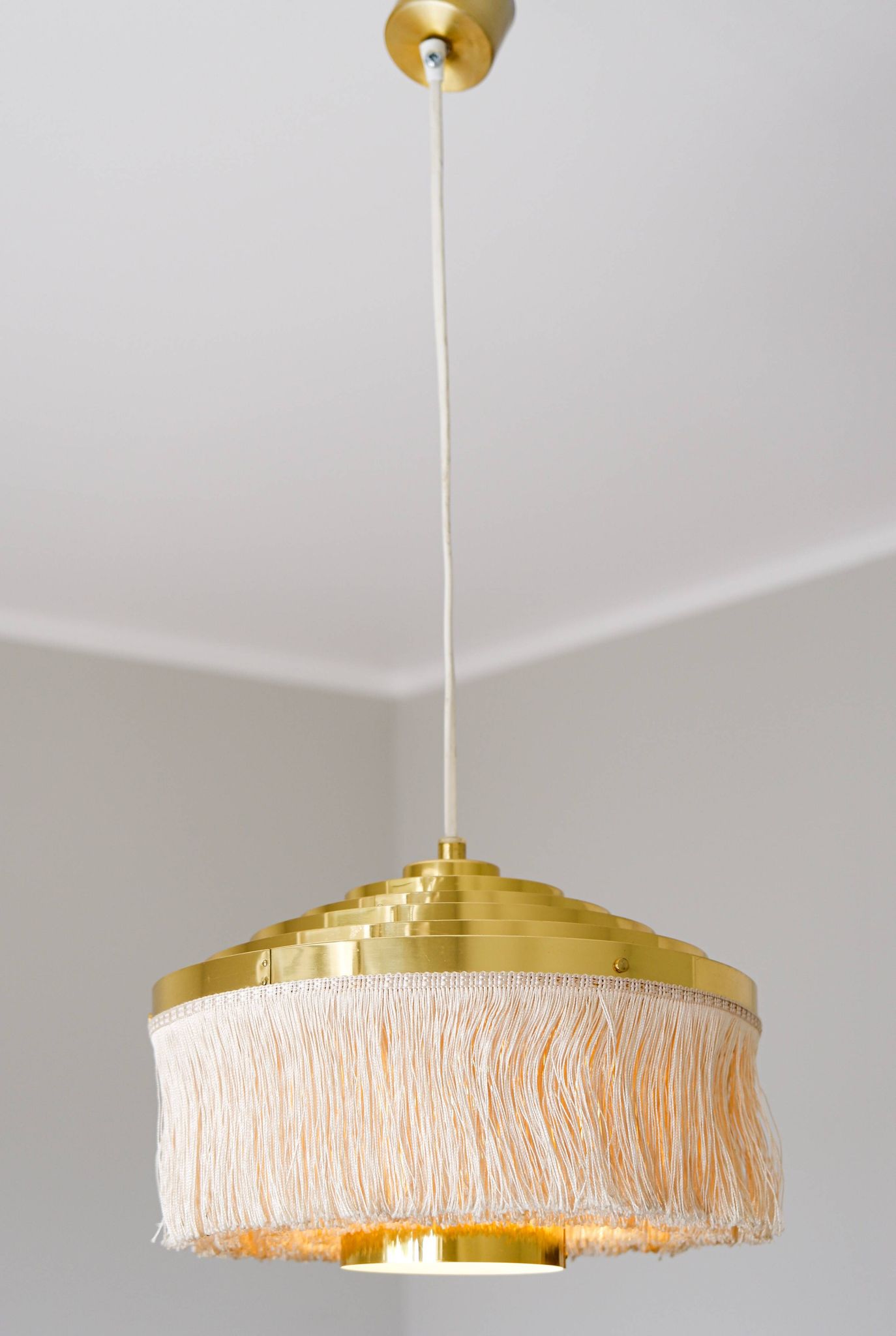 Hans Agne Jakobsson silk and brass fringe pendant circa 1960.