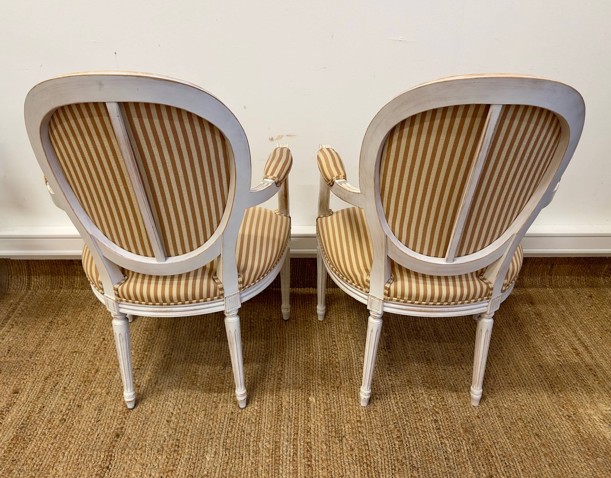 Pair of Louis XVI style medallion armchairs