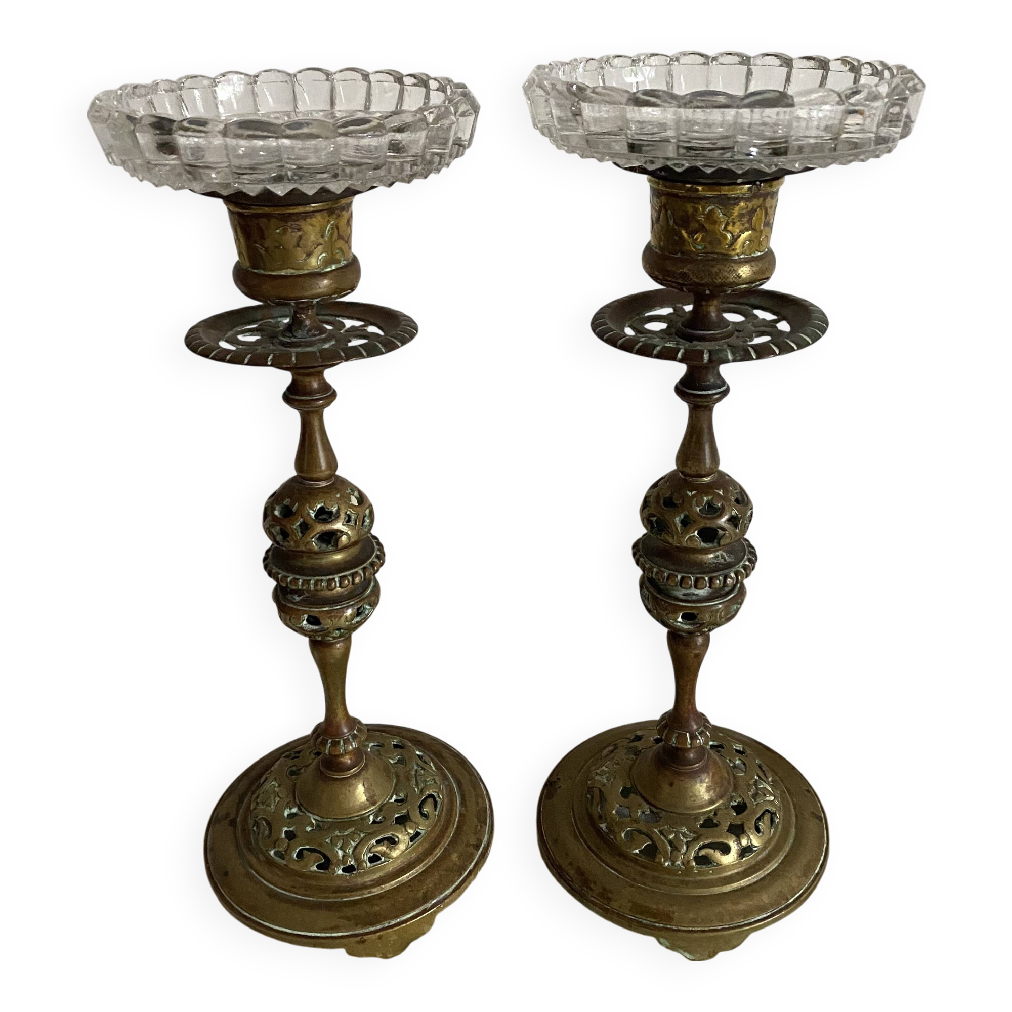 Pair of openwork brass candlesticks and glass bobeches