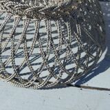 flat basket cut center table in woven metal