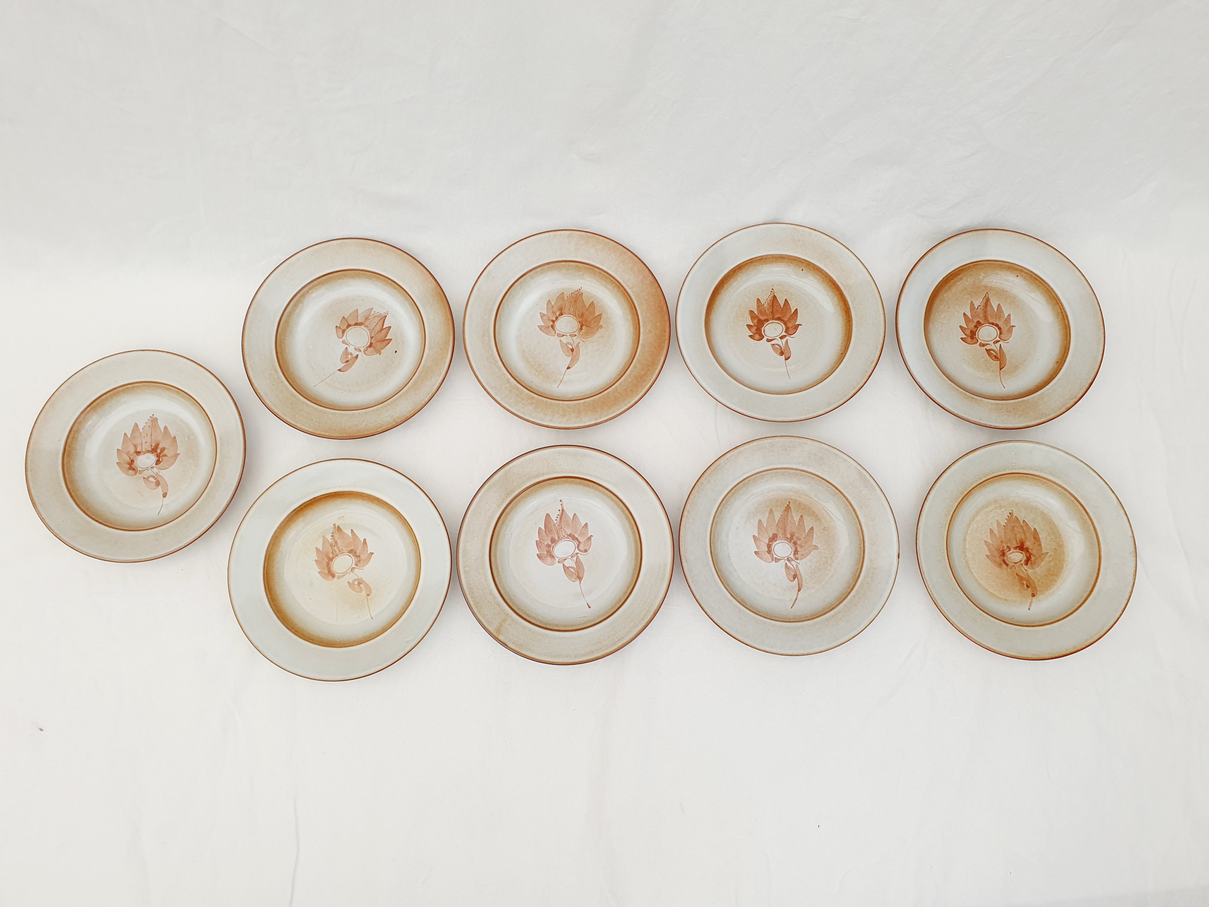 Series of 9 hollow plates pond sandstone