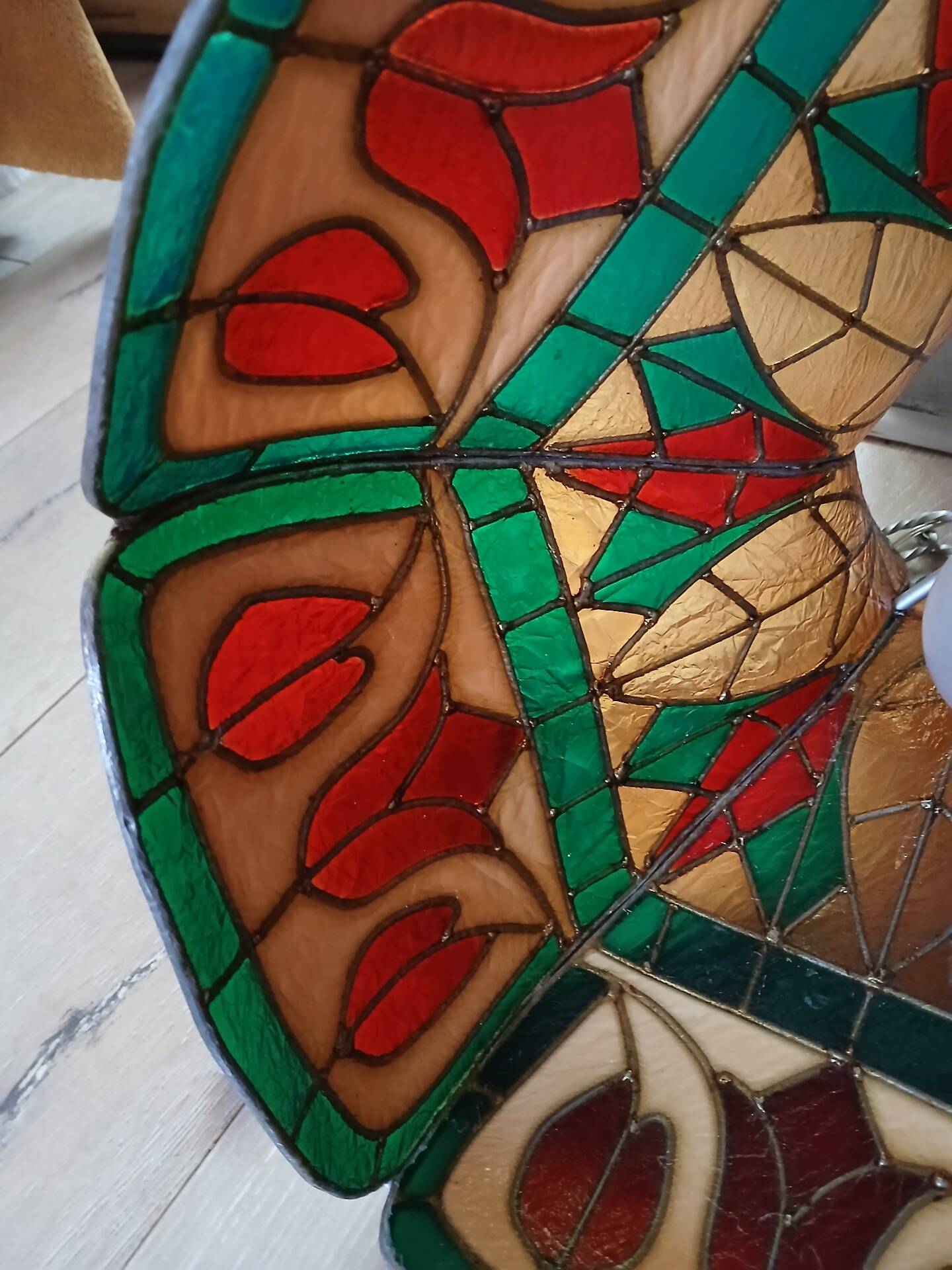 Vintage pendant light with multicoloured stained glass.