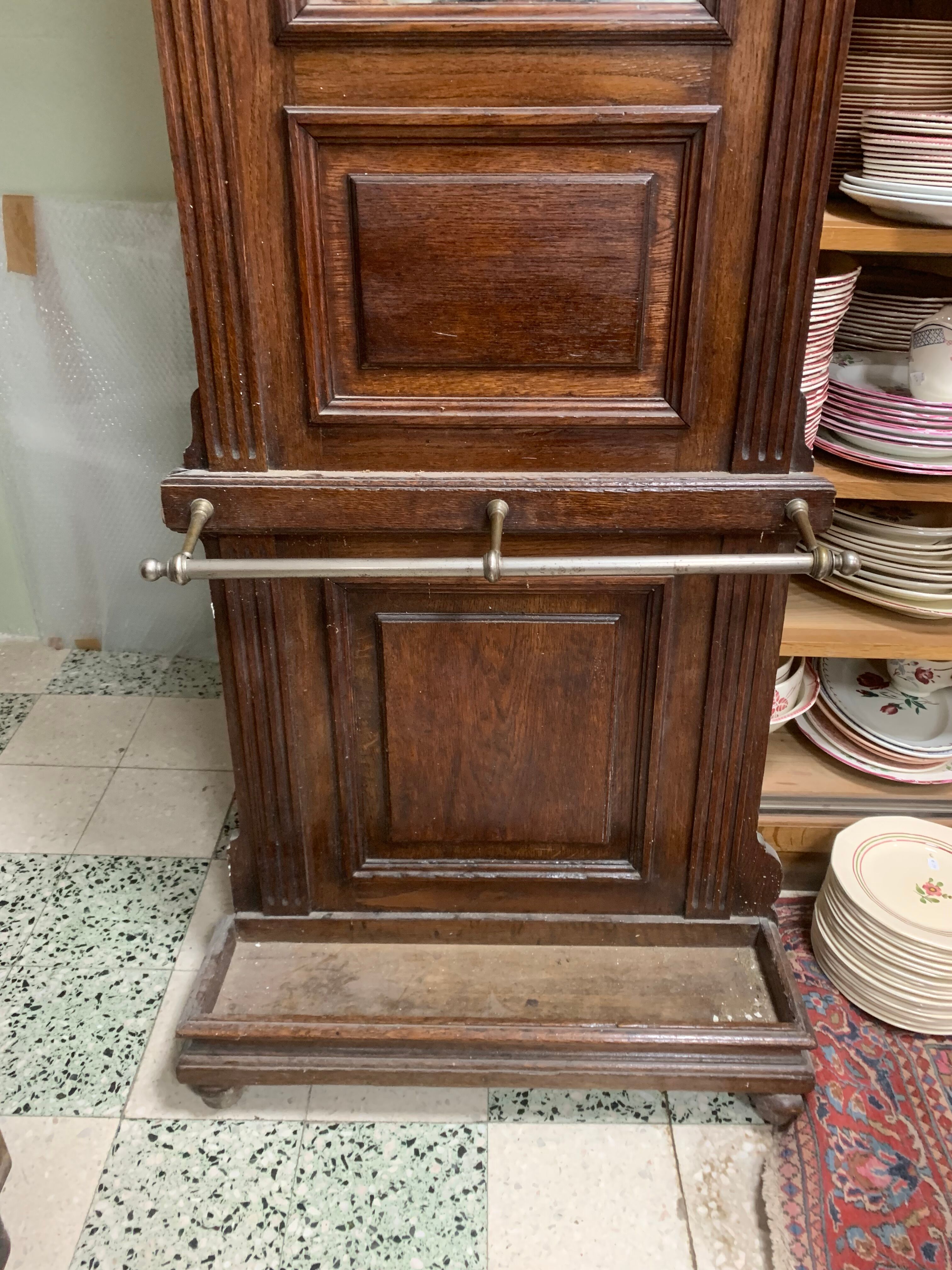 Old wall-mounted mantle-holder cloakroom in see