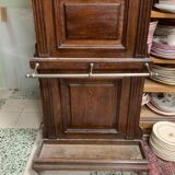 Old wall-mounted mantle-holder cloakroom in see