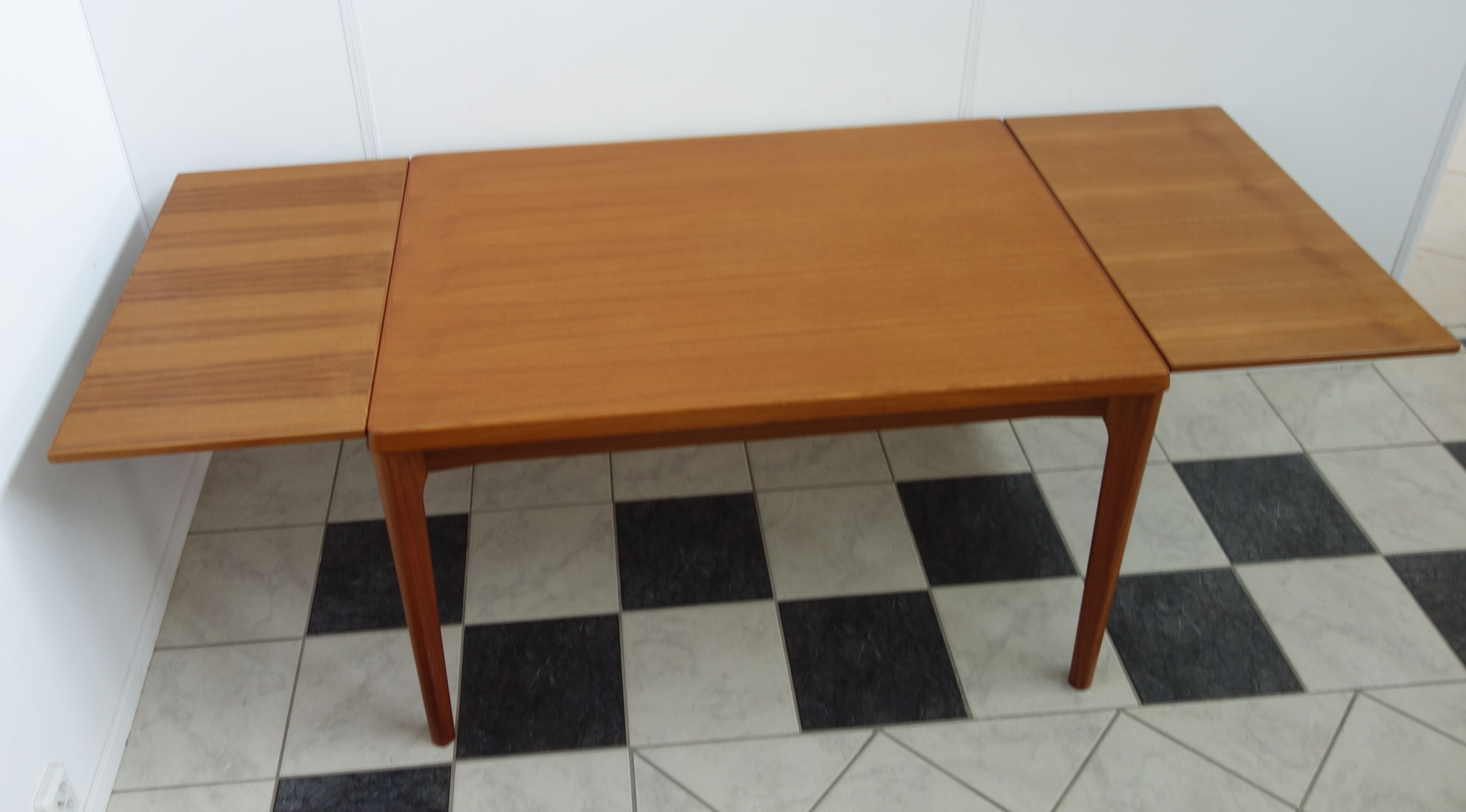 Danish teak dining table by Henning Kjaernulf 1960s