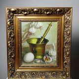 Still life with garlic, egg, and mortar signed Sarpe, 1979, oil on canvas.