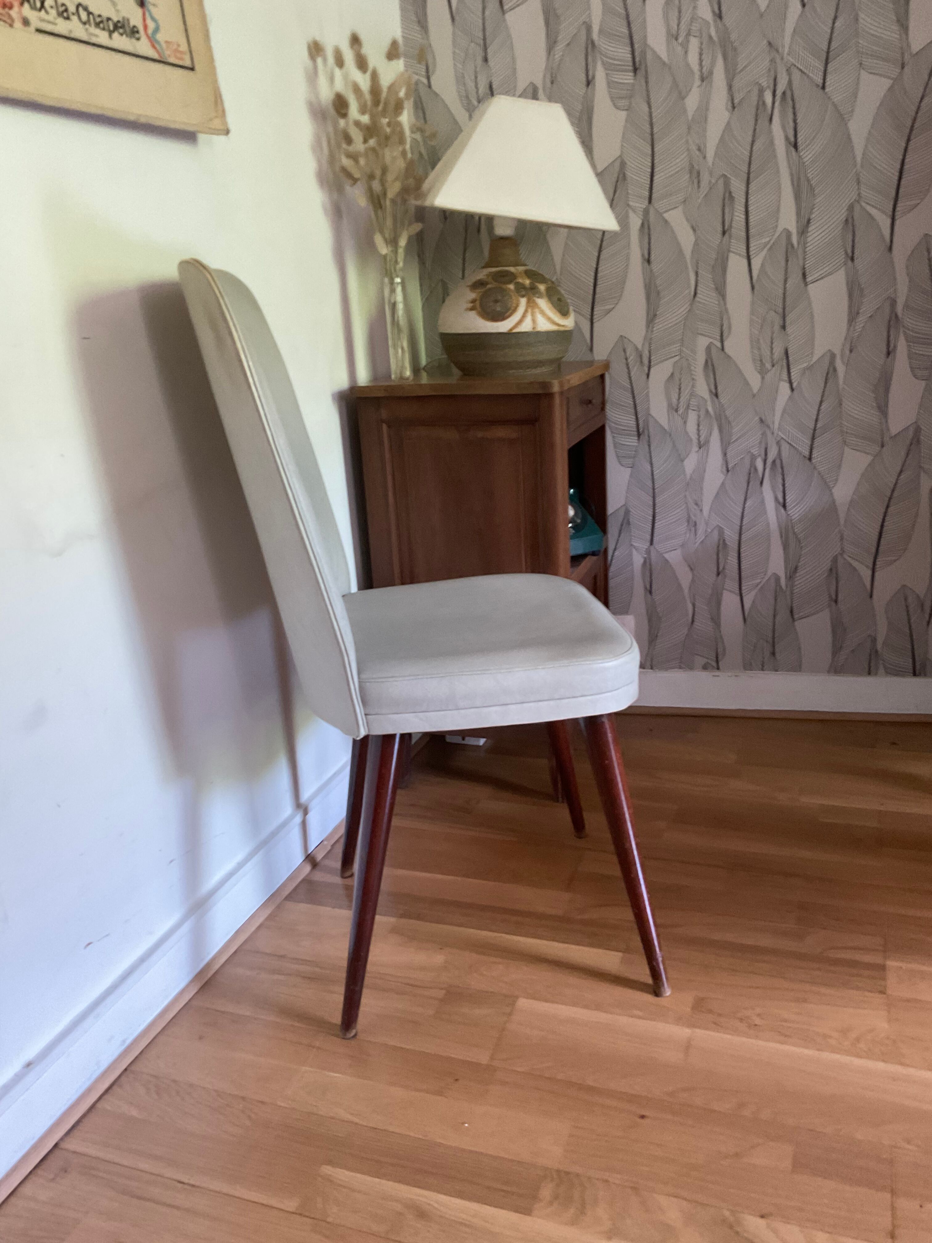Pair of vintage mahogany and skai chairs