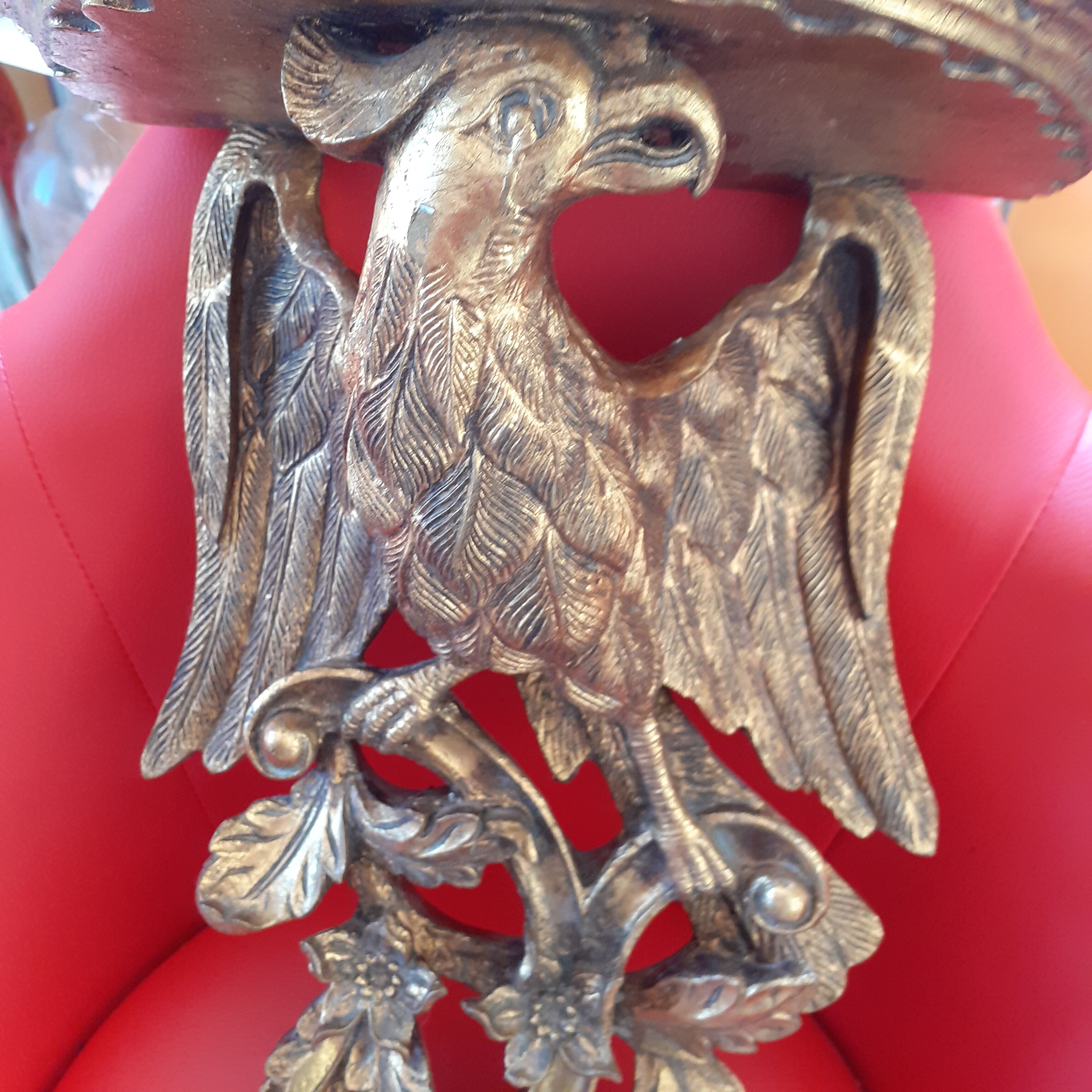 Golden wall shelf, eagle motif
