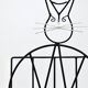Mid-century cat-shaped magazine or record holder, iron, Italy, 1950s.