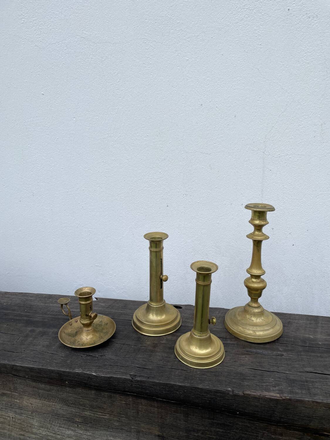 Set of gold-plated brass candlesticks