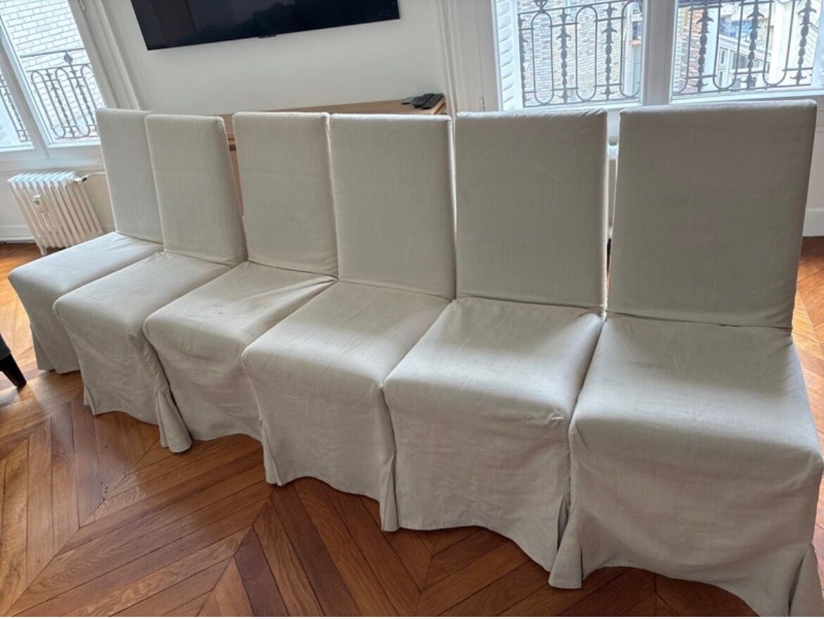 Set of 6 Maxalto chairs with covers.