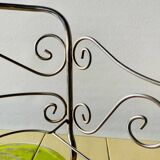 Metal doll's bed on vintage casters