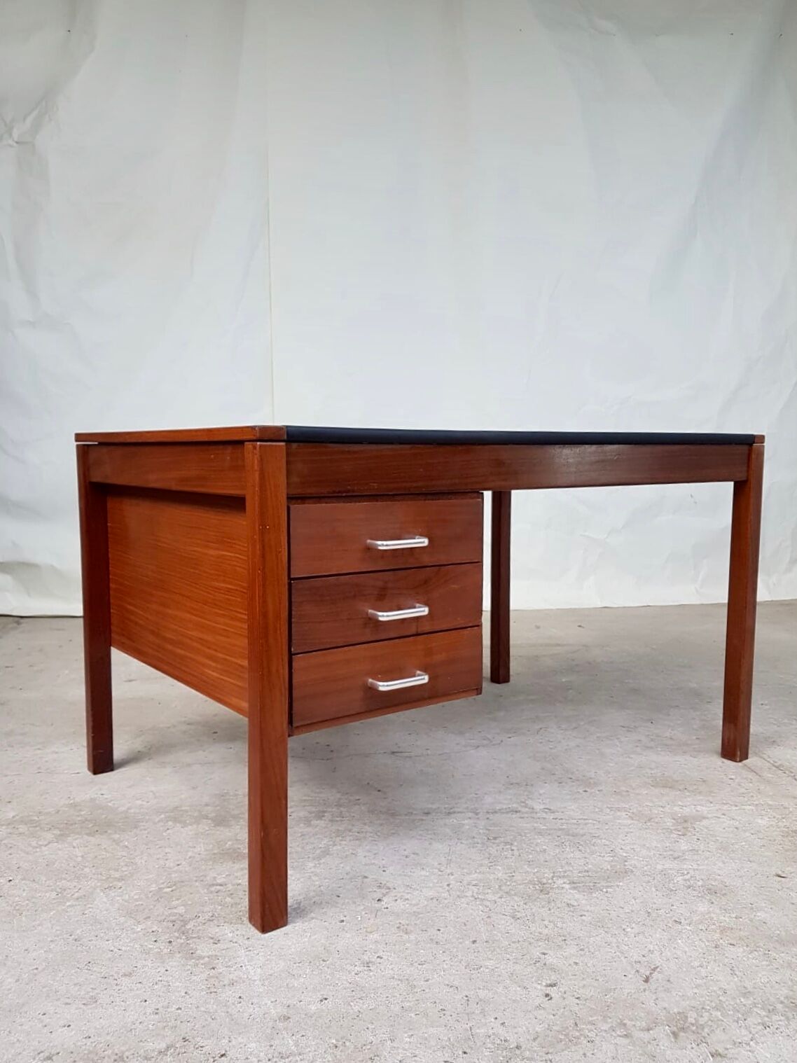 Teak desk with vinyl top