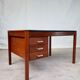 Teak desk with vinyl top