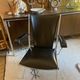Metal armchair and black skaï