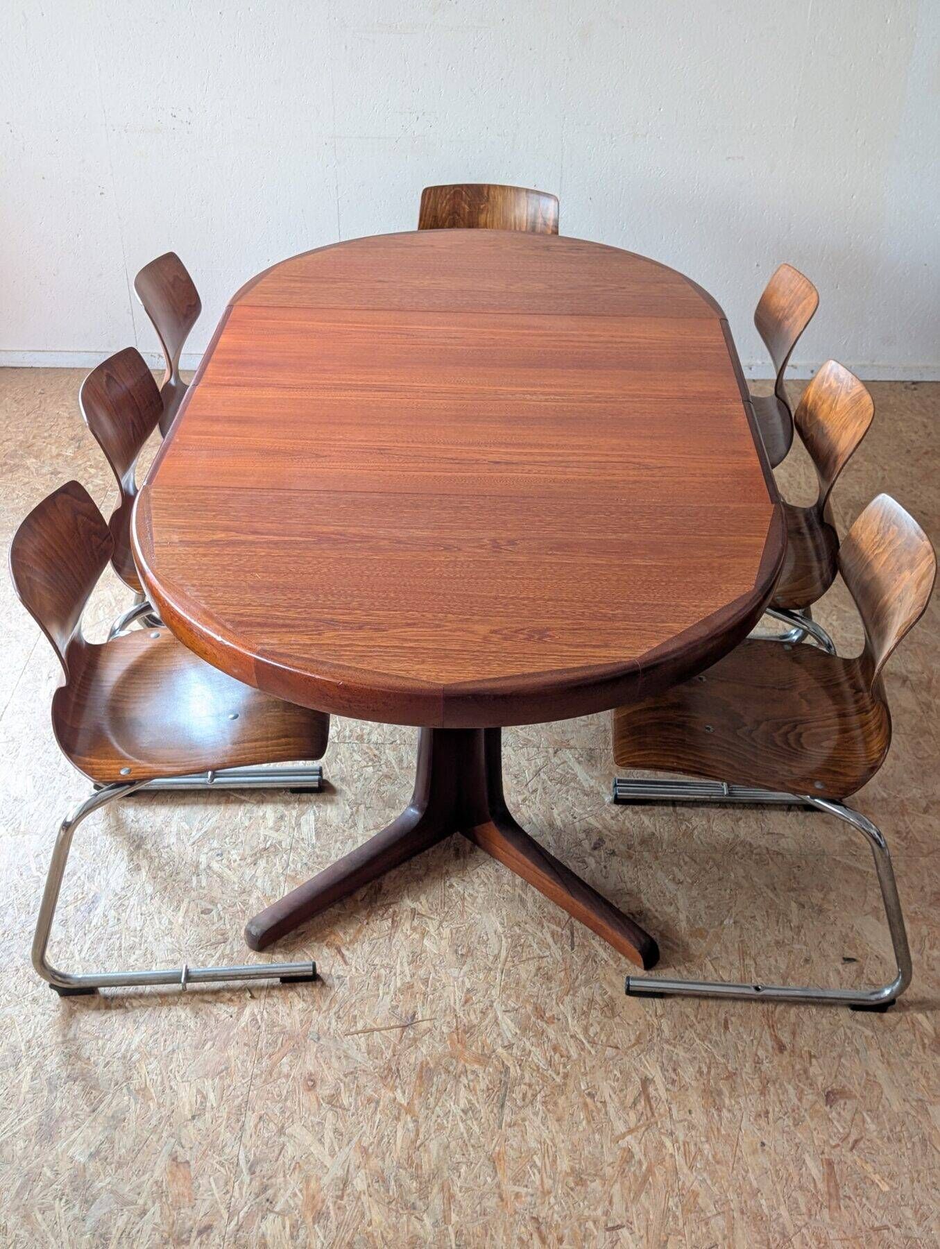 Round teak table with star base, 1960s, extendable.