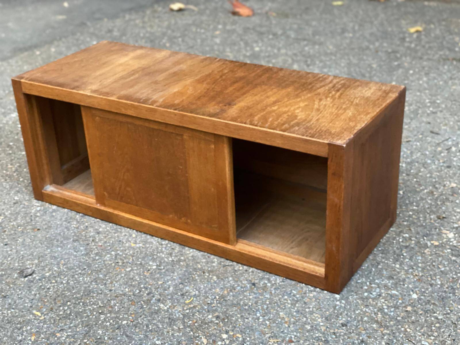 Horizontal filing cabinet with sliding curtains in oak