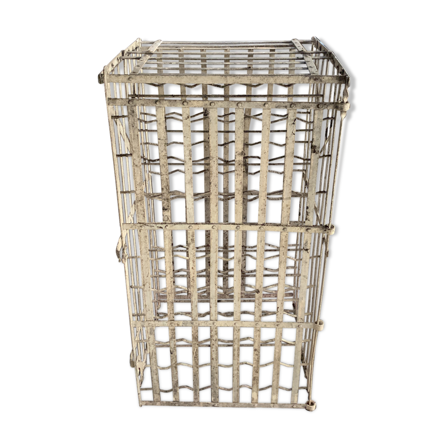 Old wine locker, metal bottle storage.