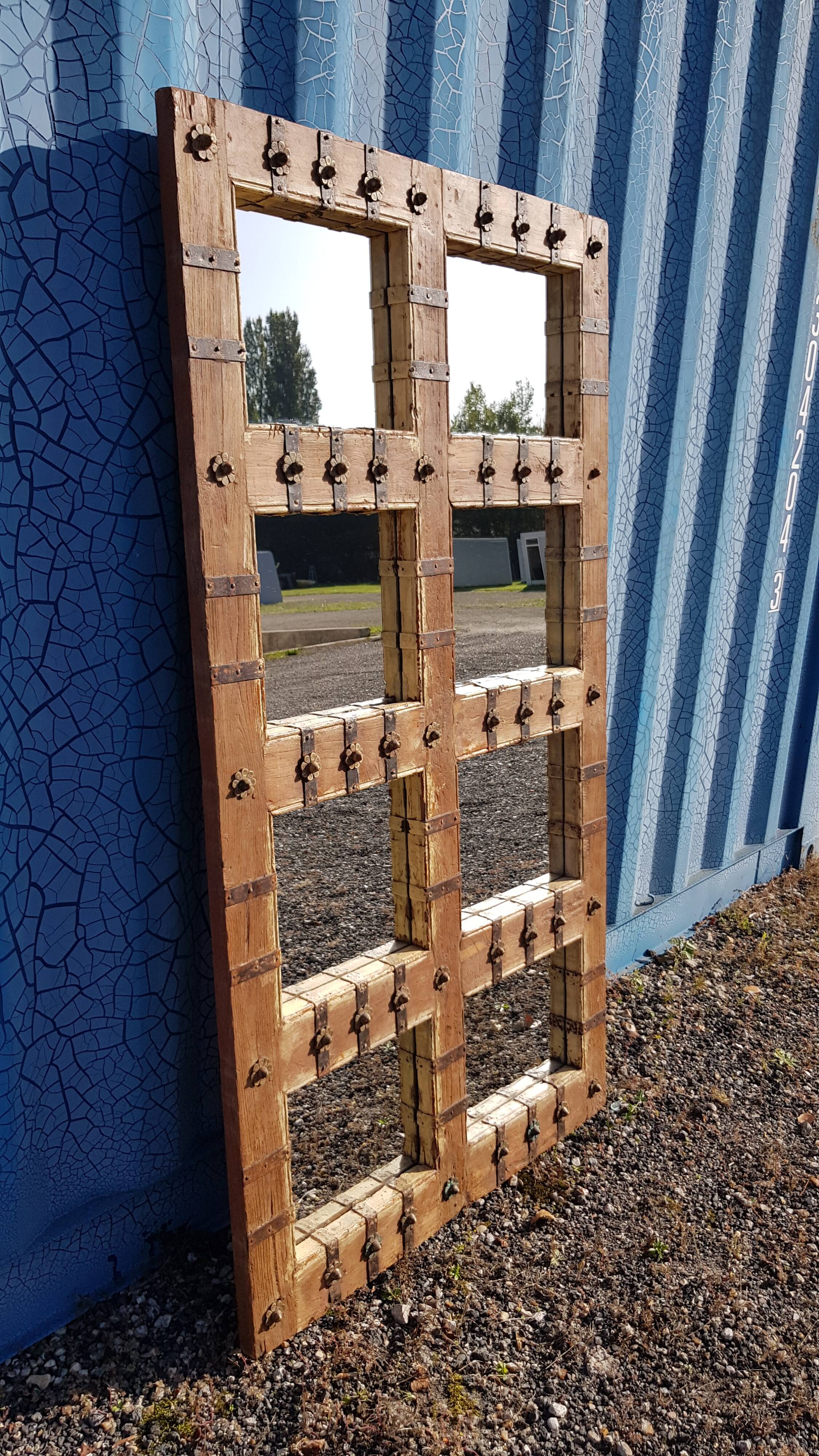 Old Burmese teak mirror with copper fittings