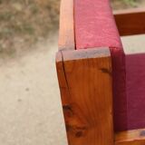 Pair of pine fireside chairs, France, 1960s, "raspberry" cushions