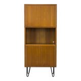 Narrow teak bookcase with two doors by Omann Jun, 1970s