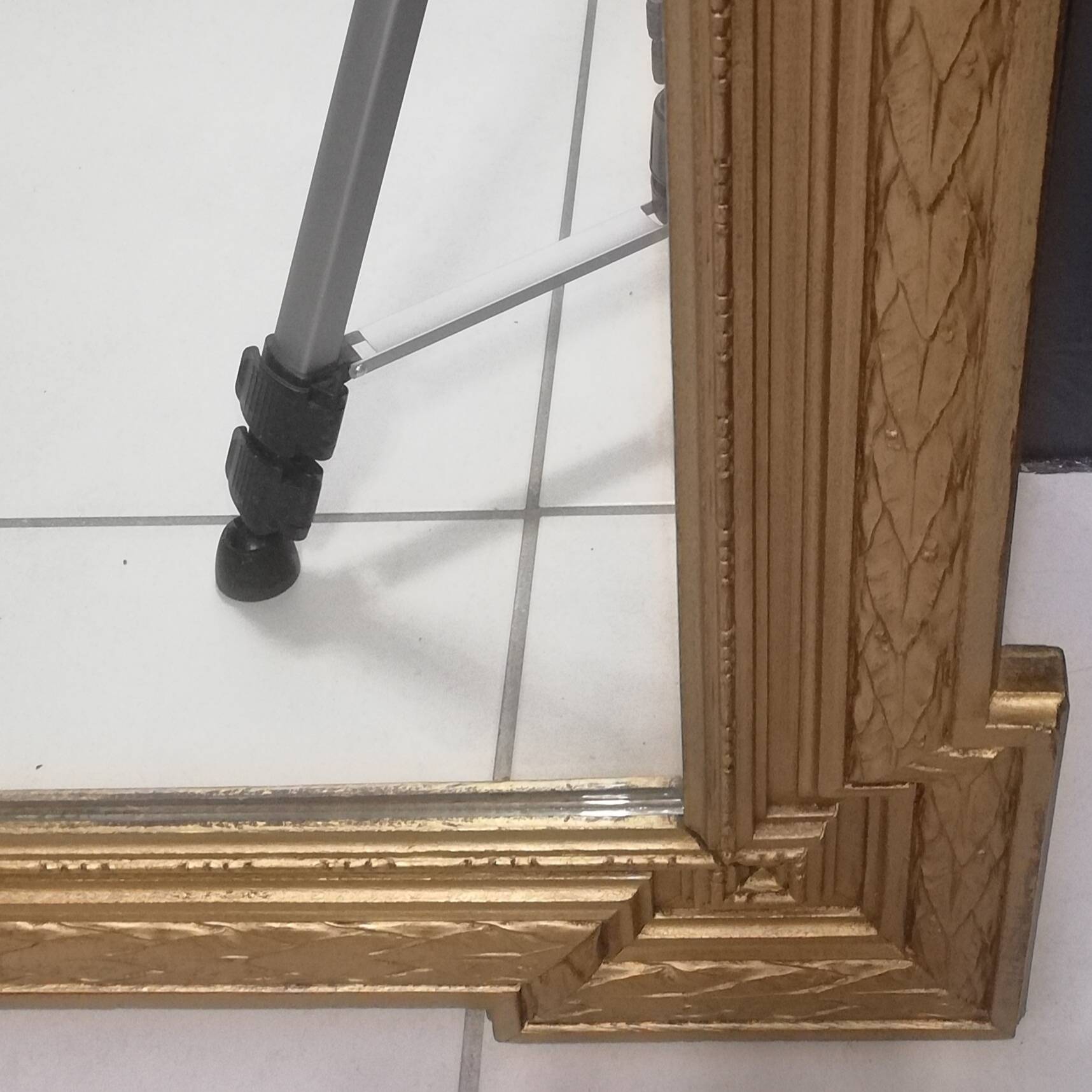 Carved wooden pediment mirror