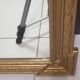 Carved wooden pediment mirror