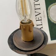 Wrought iron wall lights.