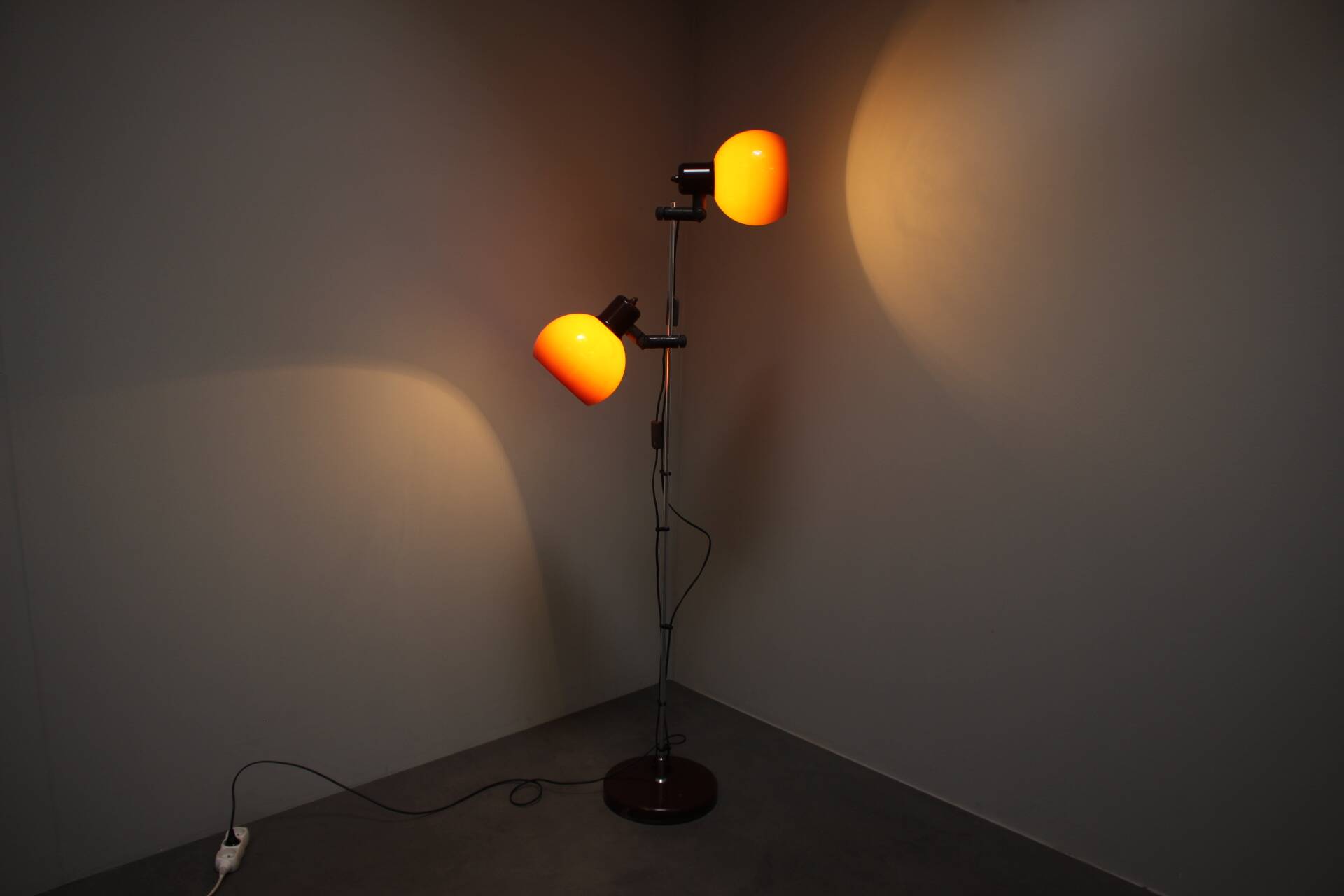 Vintage Hungarian adjustable floor lamp with two orange globe shades, circa 1970.