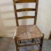 Old turned and stuffed wooden chair