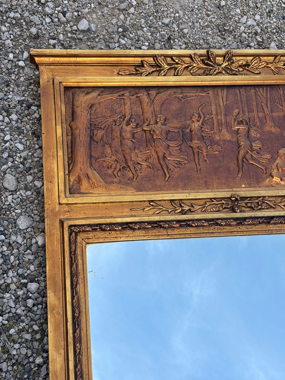 Golden trumeau mirror in Louis XVI style, 20th century.