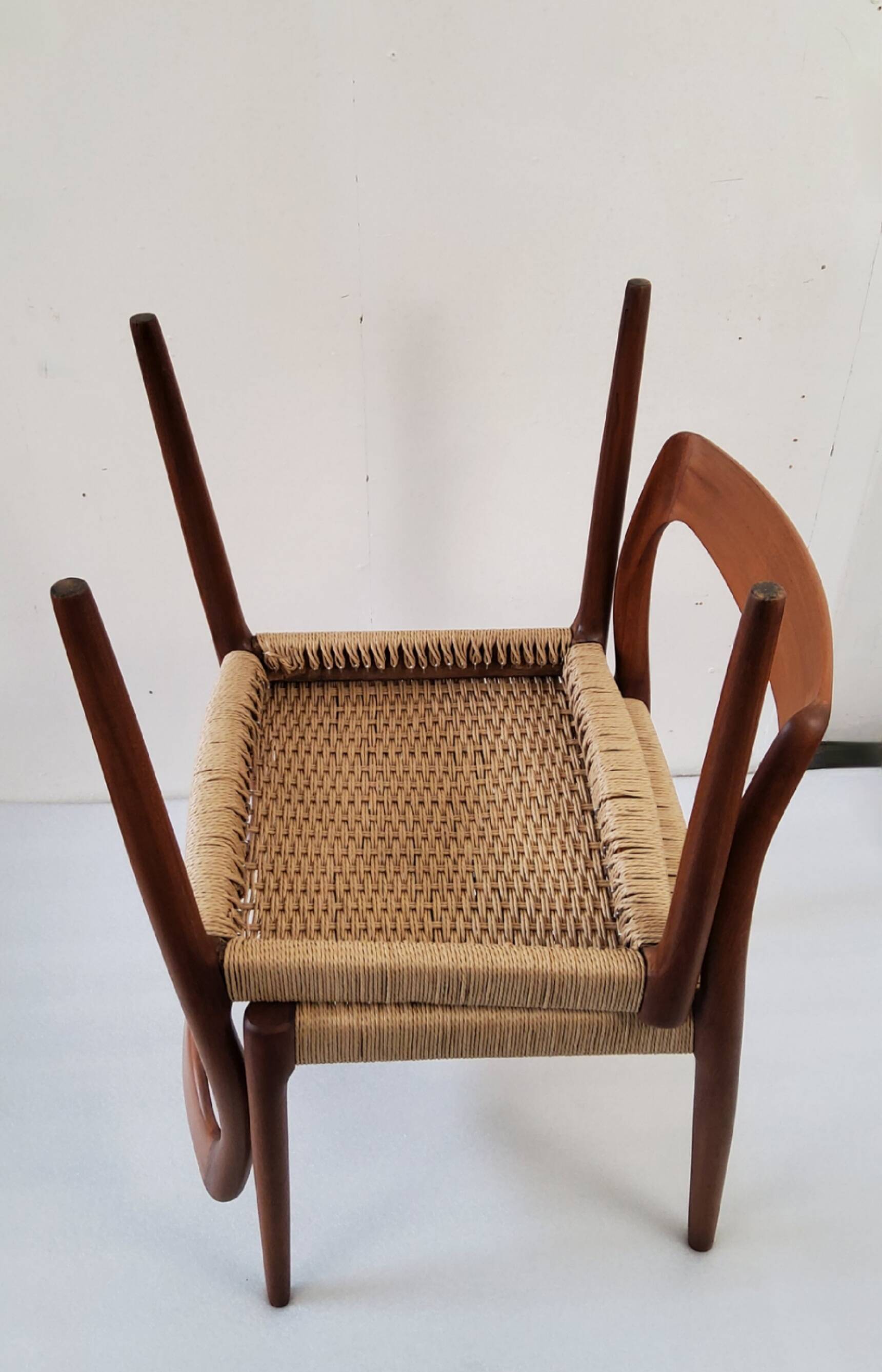 Danish dining chairs in wood and paper cord