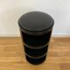 Anna Castelli for Kartell “componibili” cylindrical bedside or storage unit. plastic and black leatherette pad, three compartments. Condition of use.