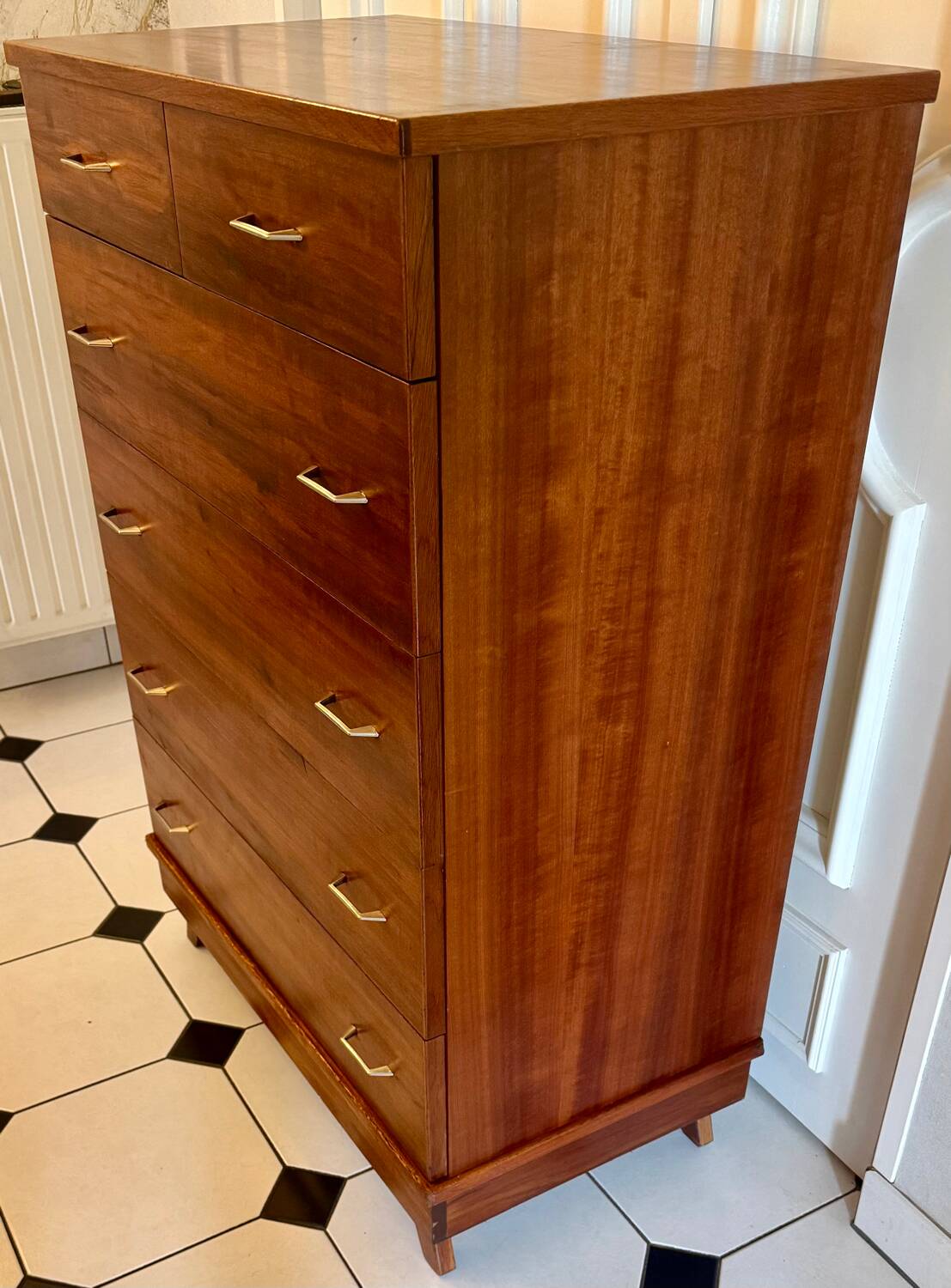 Vintage chiffonier with compass feet