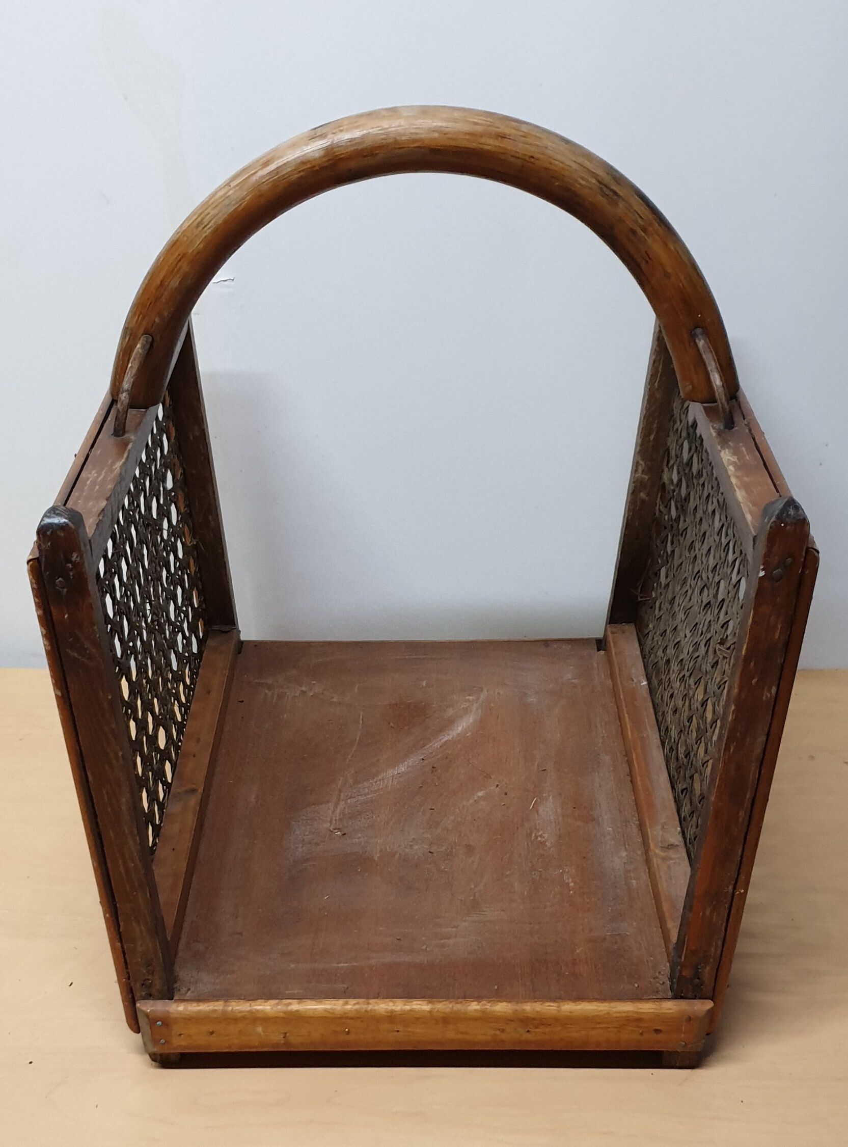 Basket has bamboo cane logs and canning