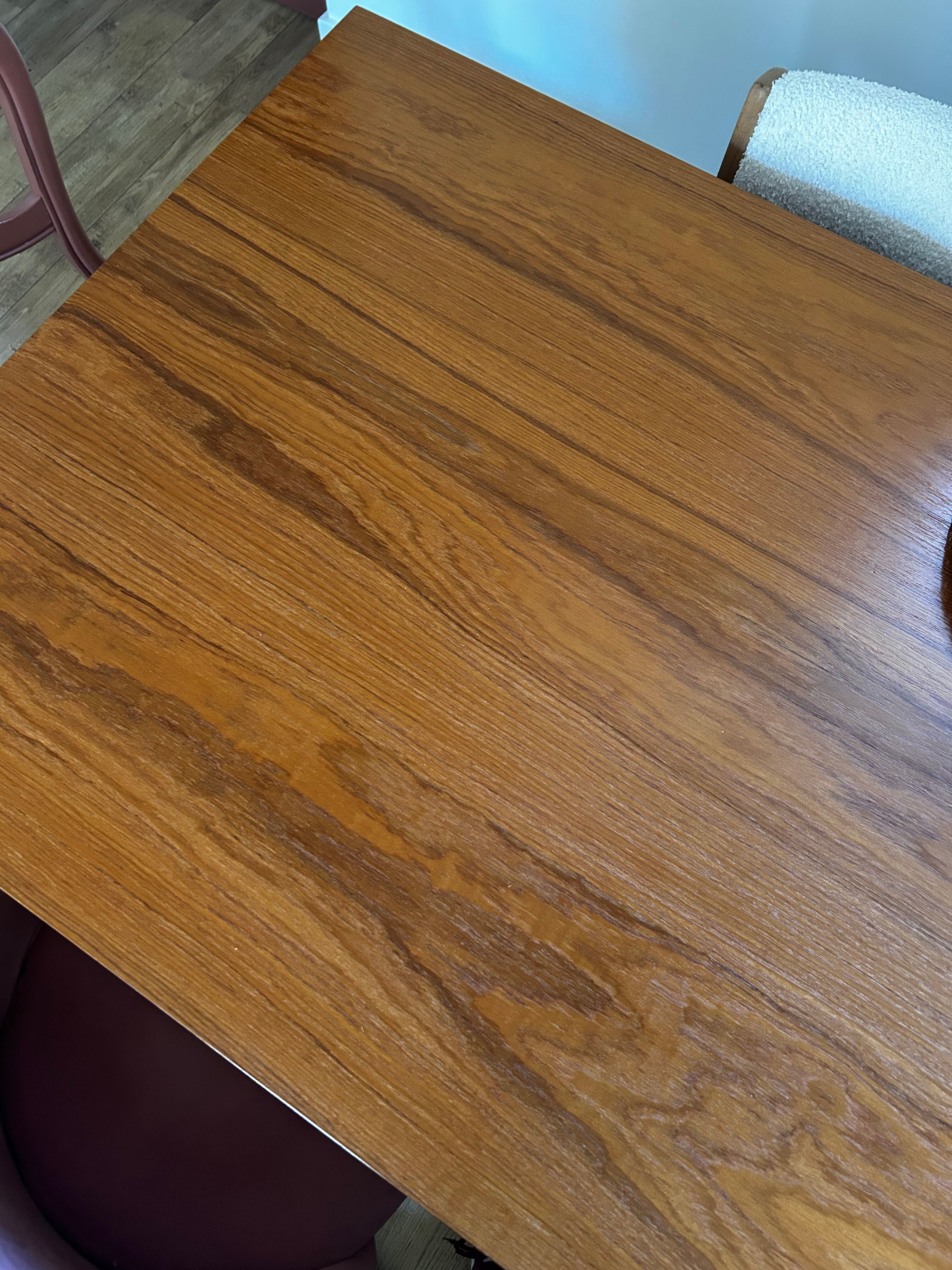 Vintage table with tapered legs.