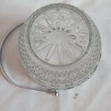 Ice bucket and spoon thereon