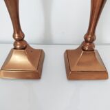 Set of a pair of candle holders and a hand candle holder