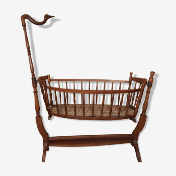 Swan-necked walnut cradle