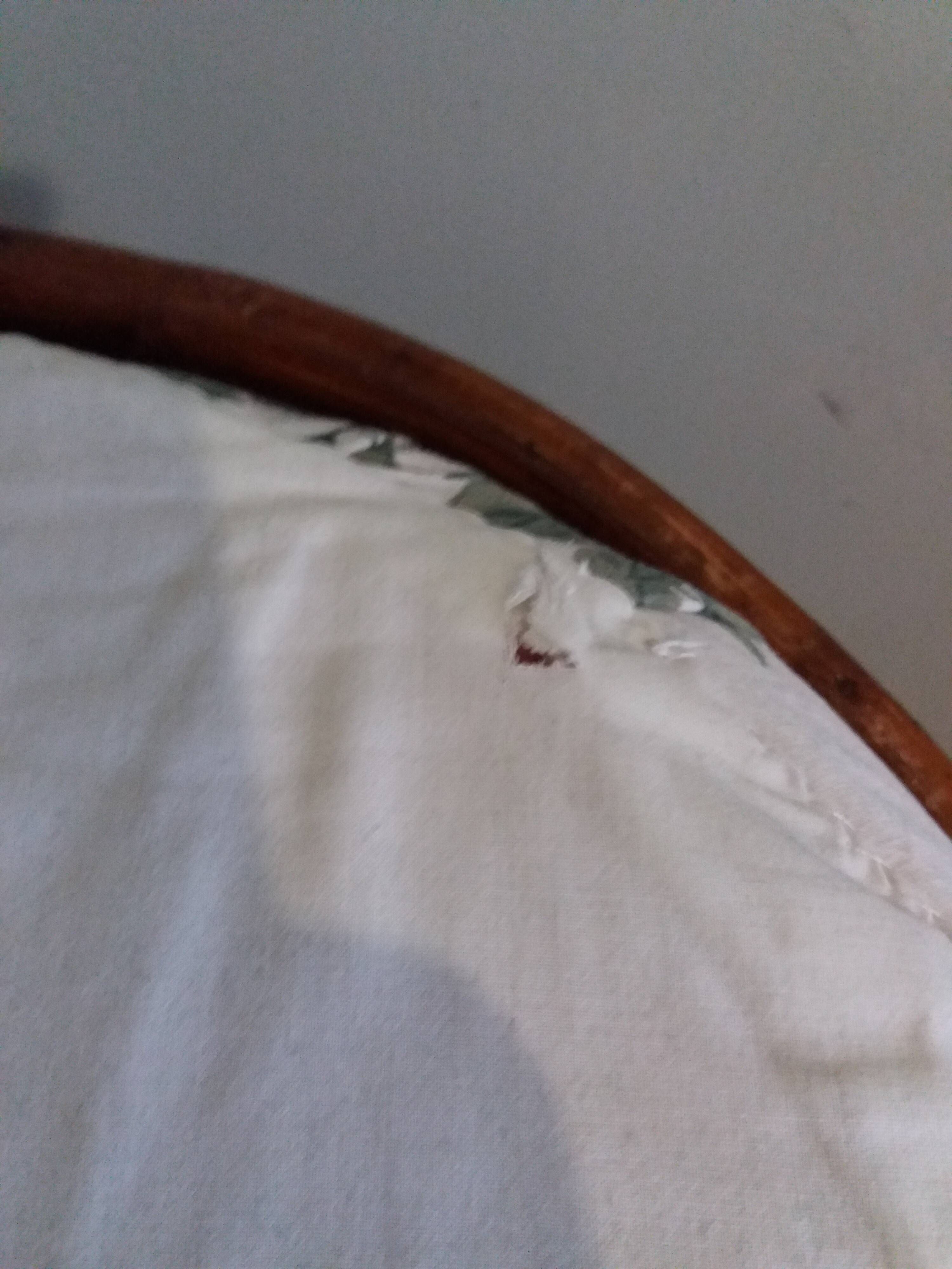 Wicker pouf with cushion