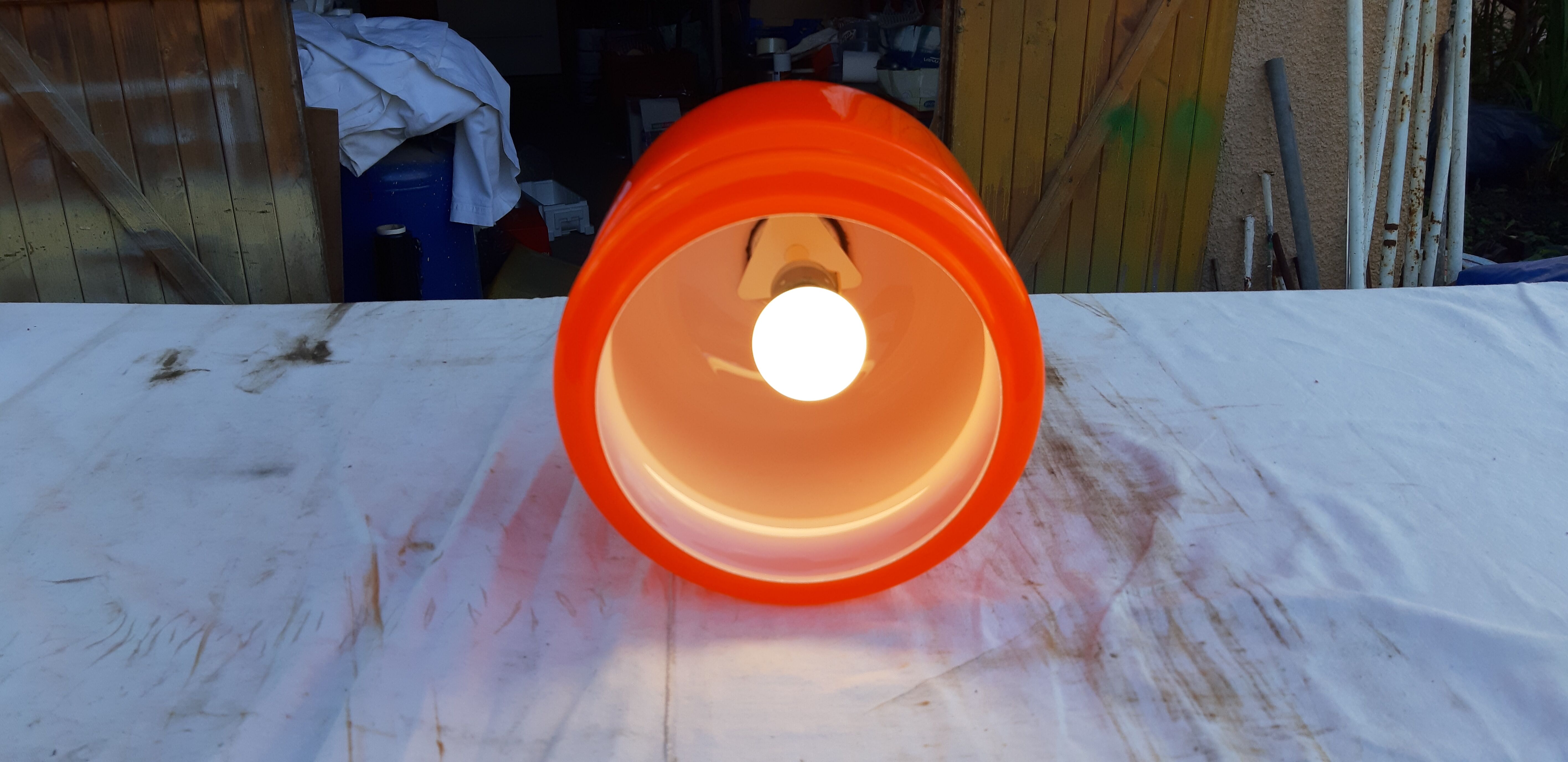Vintage lamp of the 70s in orange opaline