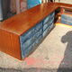 Corner base cabinet in solid Pao Rosa wood with 8 drawers and blue Alcantara lining