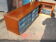 Corner base cabinet in solid Pao Rosa wood with 8 drawers and blue Alcantara lining