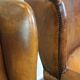 Set of 2 beautiful and correct sheep leather wingback armchairs with fixed seat cushions